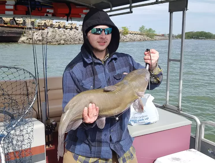 hand fishing for catfish